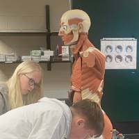 Students writing down their assessment in Anatomy and Physiology